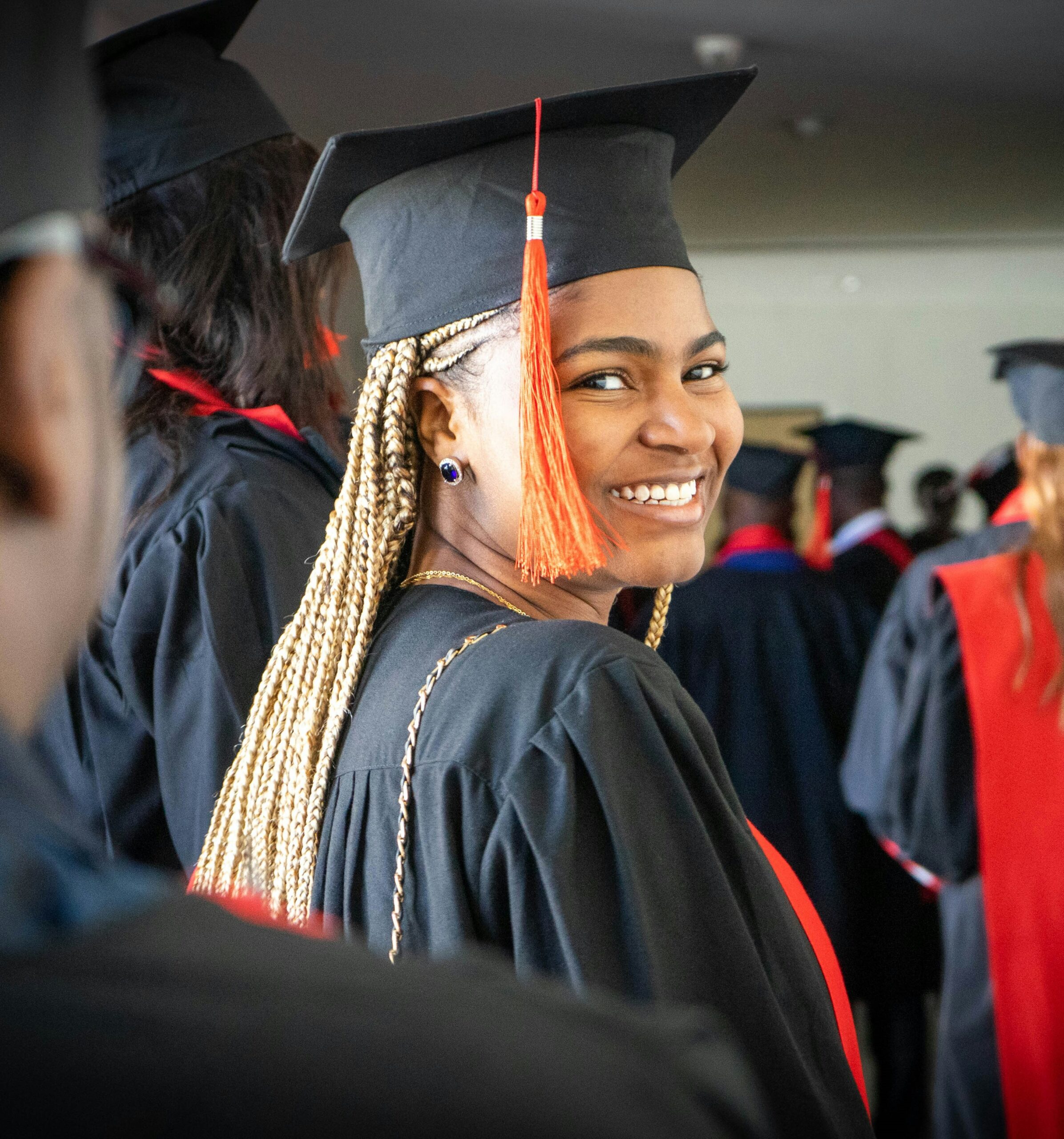 A young Black woman graduates from college
