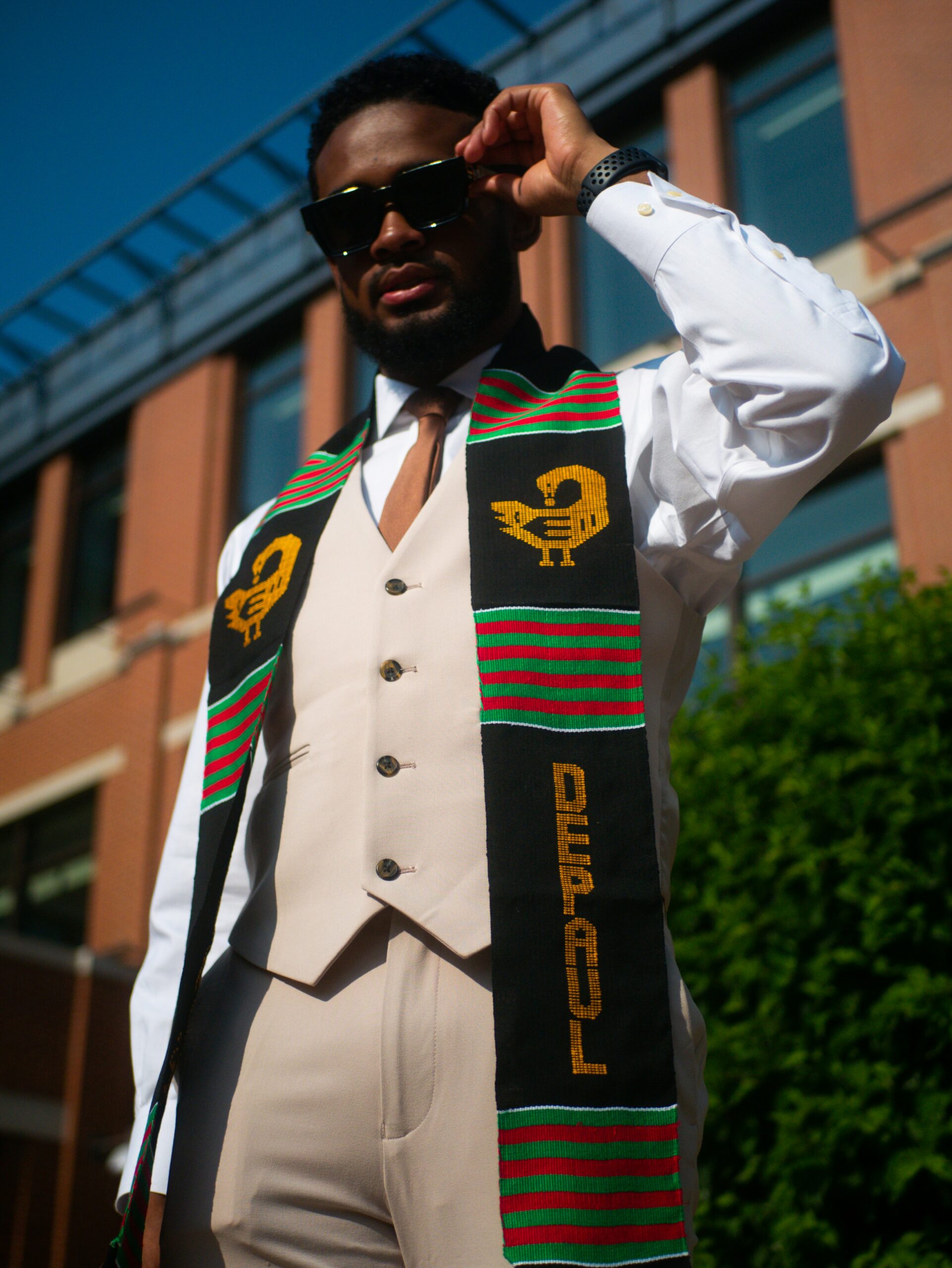A young Black male college graduate